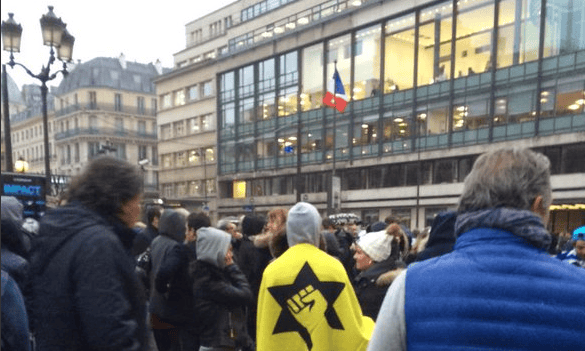 The protest outside AFP's offices in Paris