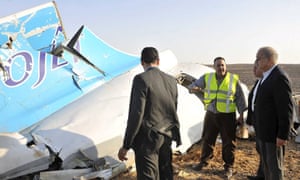 Egypt’s prime minister Sherif Ismail looks at the wreckage of the airliner.