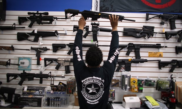 POMPANO BEACH, FL - APRIL 11:  As the U.S. Senate takes up gun legislation in Washington, DC , Mike Acevedo puts a weapon on display at the National Armory gun store on April 11, 2013 in Pompano Beach, Florida. The Senate voted 68-31 to begin debate on a bill that would significantly expand background checks for gun sales.  (Photo by Joe Raedle/Getty Images)BusinessCrimeFinanceJusticeLawRetail