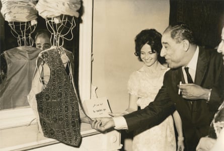Lady Cochrane Sursock with visitor to an exhibition of oriental carpets, 1963