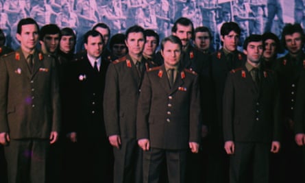 RED ARMY film still showing the hockey team and various officials in uniform.