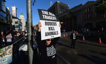 A PETA activist near where the premiere of The Longest Ride was taking place.