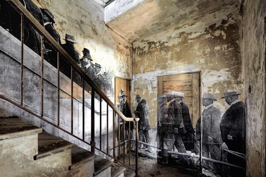 A detail of JR's installation on Ellis Island.