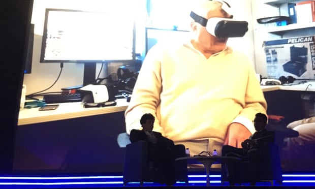 David Attenborough wearing a VR headset