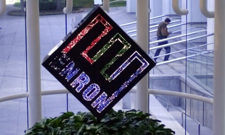 The Enron logo revolves at the company HQ in Houston, Texas, in 2002.
