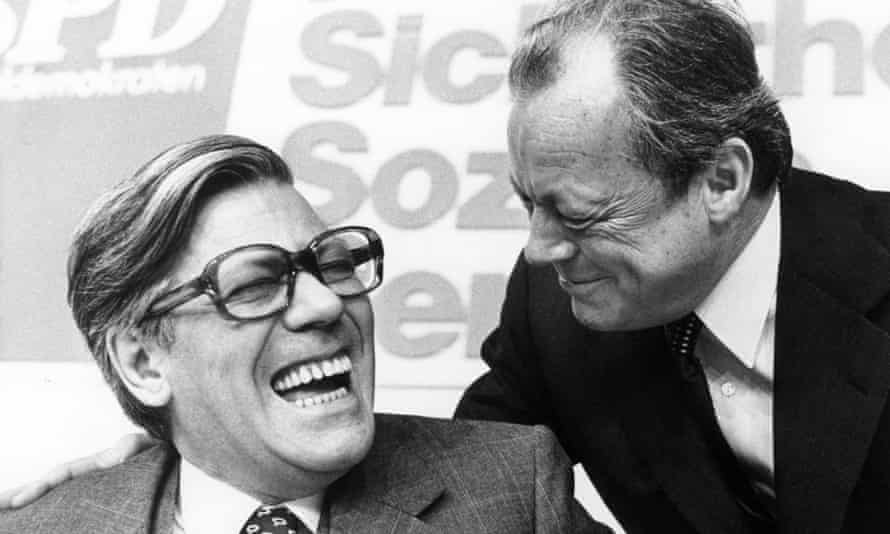 Helmut Schmidt, left, joking with Willy Brandt in 1975.