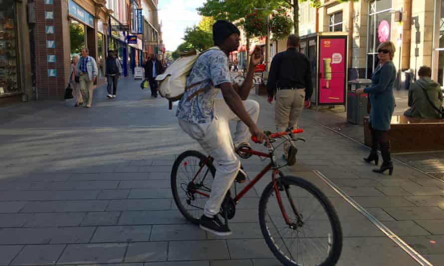 A cyclist on a shared pavement in Leicester.
