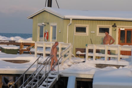 Bathers swim in the sea at Ribersborgs Kallbadhus through the winter.