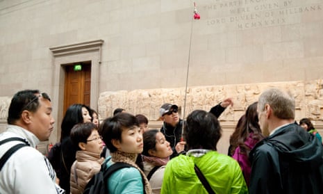 Tourists on a guided tour of the British Museum.