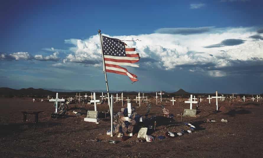 A shredded American flag at a grave site in Blackwater, Arizona.
