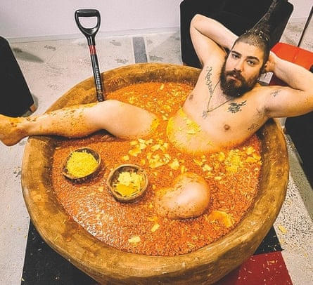 Photograph of Josh Ostrovsky in a bowl of chilli