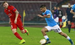 Napoli's Lorenzo Insigne dribbles past Midtjylland's Austrian midfielder Daniel Royer during the Europa League Group D game.