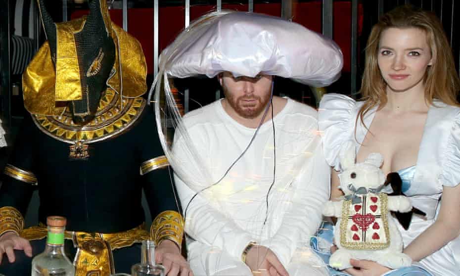 Entrepreneur Sean Parker, seen here at the Playboy Mansion Halloween party on 24 October, between Tesla CEO Elon Musk and actress Talulah Riley