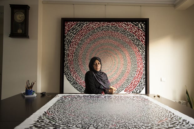 Azra Aghighi, 49, was born in Qom and fell in love with the forms of her written language early on. She studied a traditional form of calligraphy at university and devoted herself full-time to her art once her children had grown. She finds working long hours at her canvasses therapeutic. While religion is a big inspiration, she says it’s not at the heart of her practice. She believes that the forms of her letters go beyond the meaning of the words.