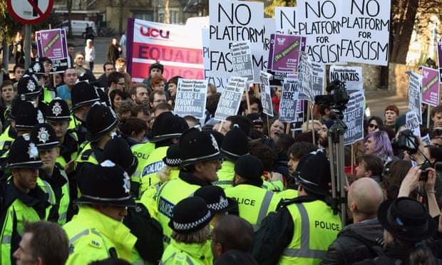 Protesters and police clash at Cambridge university in 2013.