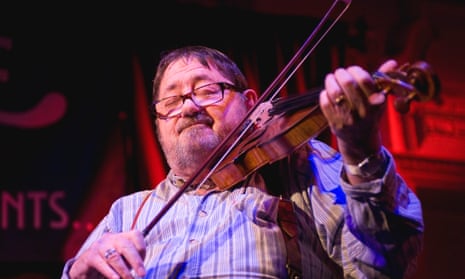 Dave Swarbrick fiddles on stage at Bush Hall in London.