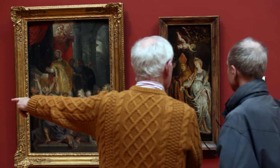 Visitors study paintings at the Dulwich Picture Gallery in an effort to find the replica sourced from a Chinese workshop and hung in the original frame.