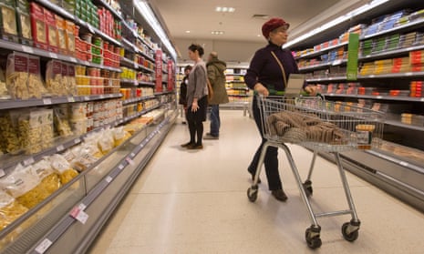 Shoppers browse in a Waitrose store.