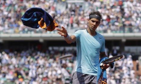 Rafael Nadal throws a towel