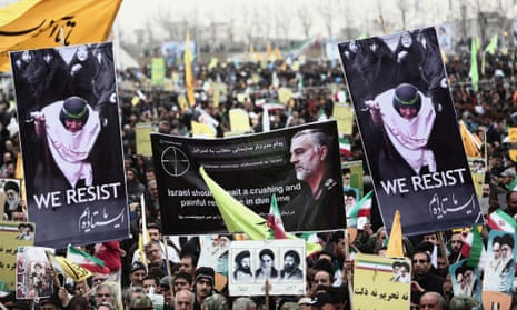 During a rally to mark the 36th anniversary of the Iranian revolution, demonstrators in Tehran hold a portrait of Iranian commander Major Gen Qassem Soleimani (center), who has been advising Iraqi military leaders fighting Islamic jihadists.