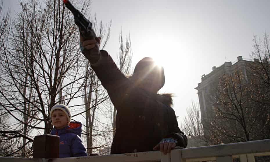 A boy with a toy gun in Donetsk, eastern Ukraine