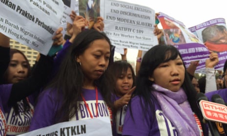 Erwiana Sulystyaningsih, right, is joined by supporters in Hong Kong demonstrating against abuse of women domestic workers.