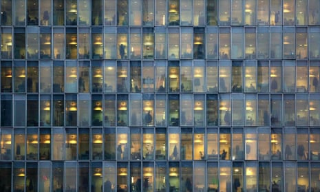 People at work in an office block