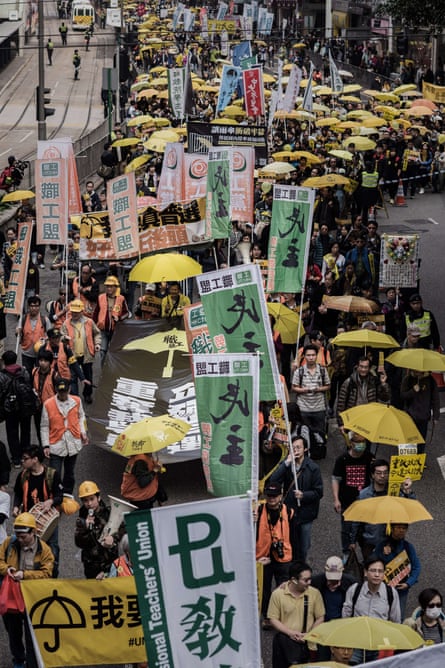 Demonstrators march for democracy in Hong Kong.