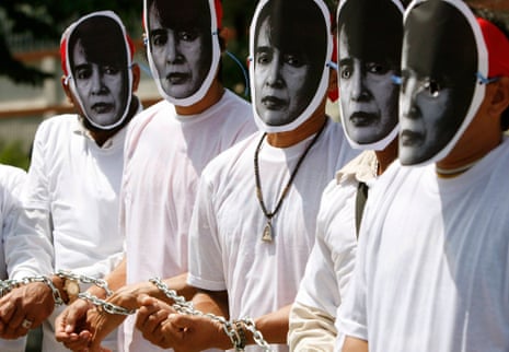 Activists wearing masks of Myanmar’s opposition leader Aung San Suu Kyi