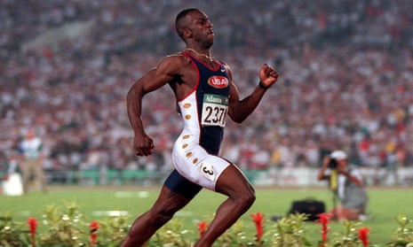 Michael Johnson of the United States wins men's 200 meters in a new world record time of 19.32 at the 1996 Summer Olympic Games in Atlanta.