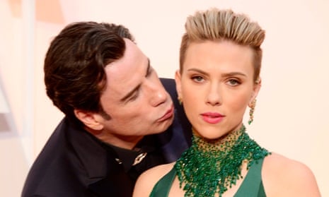 The face of this year’s Oscars … John Travolta and Scarlett Johansson