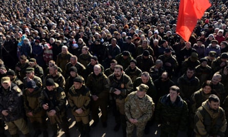 Pro-Russian separatists of the self-proclaimed DPR attend the rally Defenders of the Fatherland day.