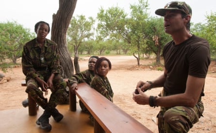 Craig Spencer, right, debriefs the members of the Black Mamba anti poaching unit. 