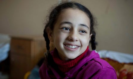 Weam Al Astal, pictured two days after she had an operation on her leg in al-Shifa Hospital.