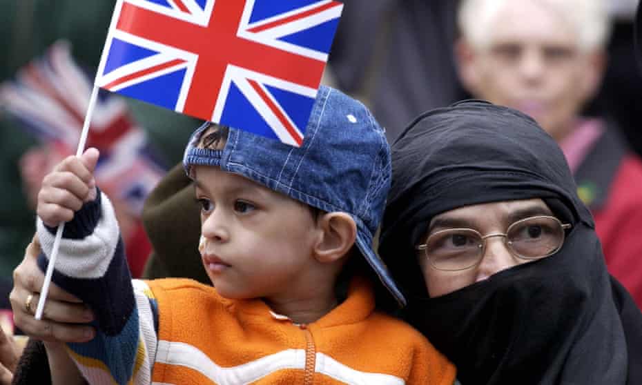 A British Muslim mother with her son in London.