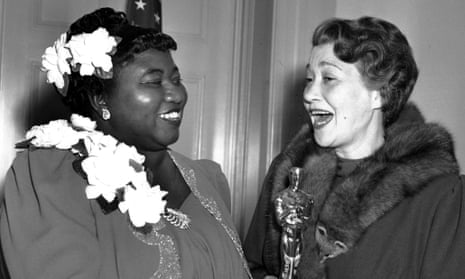 Hattie McDaniel with her best supporting actress Oscar, presented by Fay Bainter