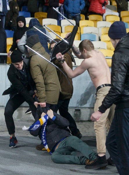 Dynamo Kiev's supporters fight among themselves after play was halted.