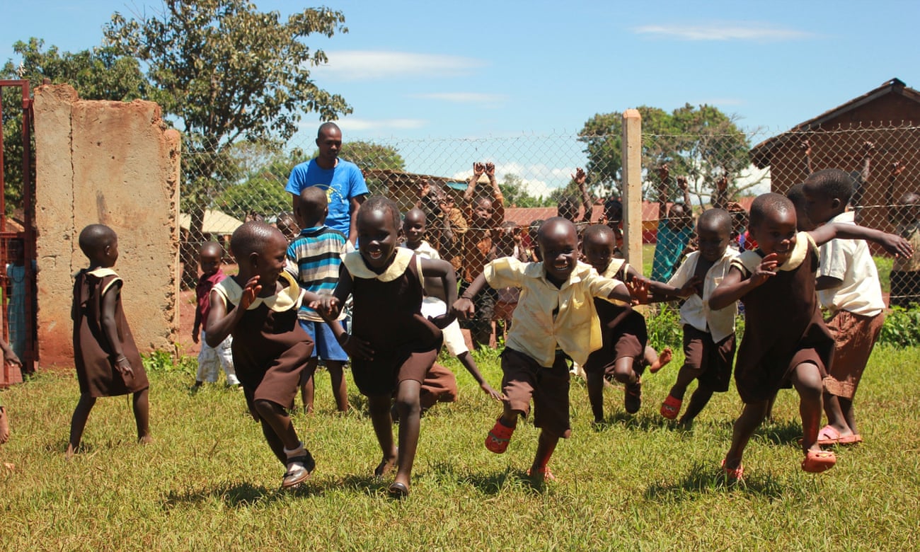 Children running a race Uganda