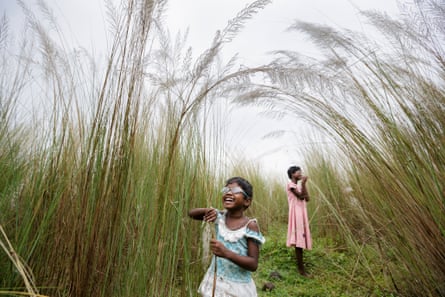 Sisters Anita, five, and Sonia Singh, 12, explore a world of light after having operations to correct cataracts in West Bengal, India. The image, by South African photographer Brent Stirton, has been shortlisted for the 2015 Sony world photographic awards