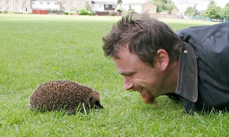 Hugh Warwick with a hedgehog
