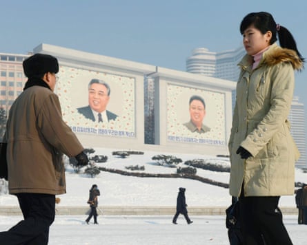 Portraits of North Korea's national founder Kim Il Sung (left) and late leader Kim Jong Il in Pyongyang, North Korea.