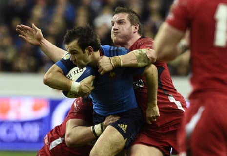 France's scrum half Morgan Parra is tackled during a tight first half.