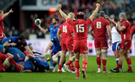 Wales' players celebrate victory.