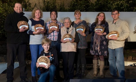 Jorge Pereira and Betty Lethbridge, fourth and fifth from left, with the other winners.