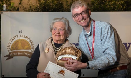 Betty Lethbridge receives her prize on Saturday.