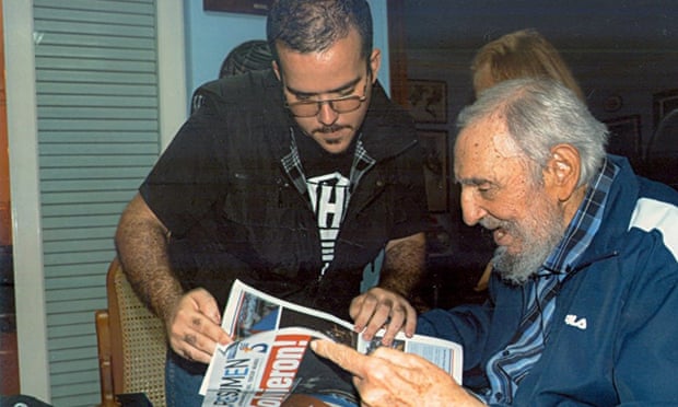 Former Cuban president Fidel Castro talks to the president of Cuba's University Students Federation, Randy Perdomo, during a meeting in Havana in January.