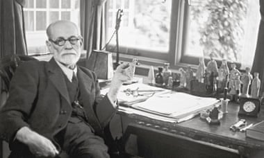 Sigmund Freud at his desk.