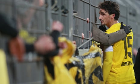 Mats Hummels talks to Borussia Dortmund supporters after the defeat to Augsburg.