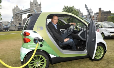 Quentin Wilson in a Smart electric car in London.