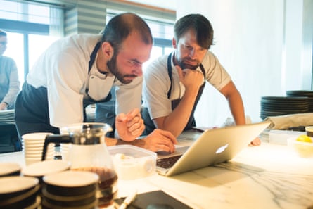 Head chef Daniel Giusti and René Redzepi discuss the menu and guest list at Noma.